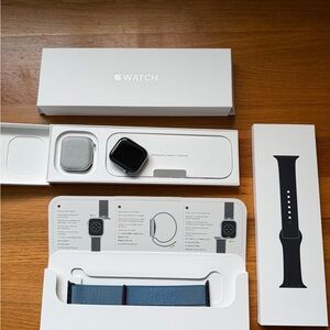 Apple Smartwatch with Black and Blue Bands